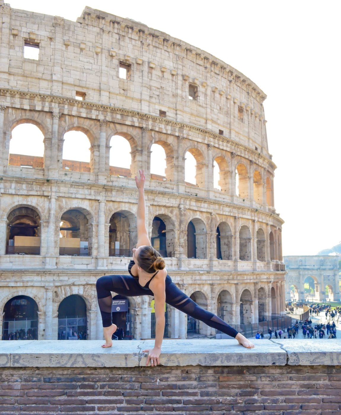Yoga pose at the Colosseum, Rome Italy