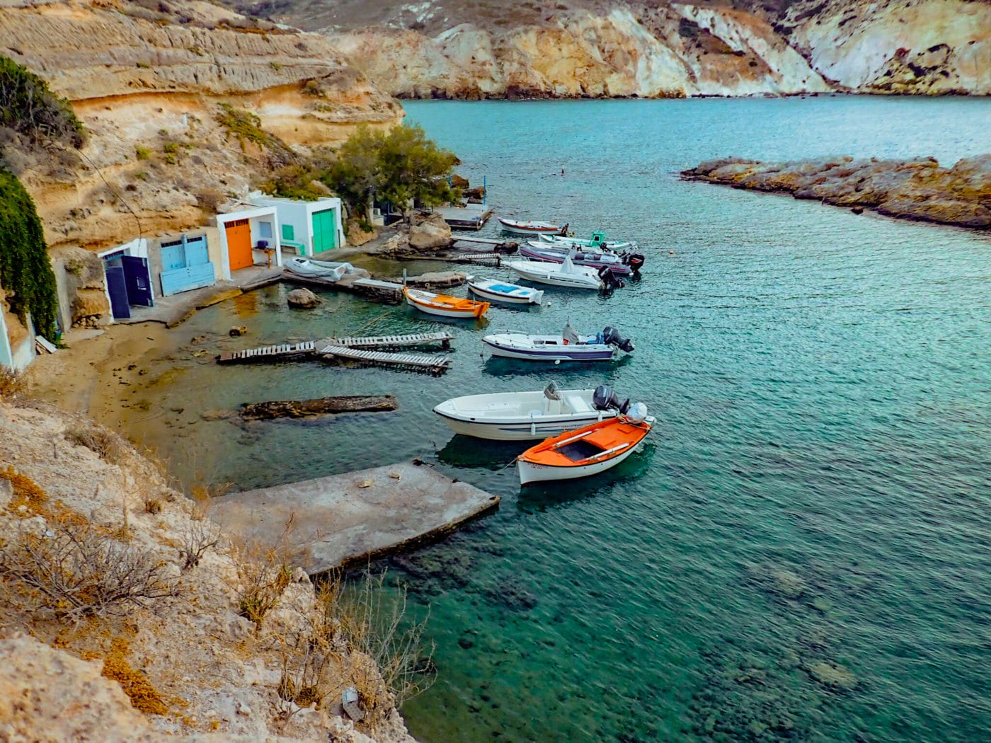 fisherman village with colored boat garages in Mandrakia on Milos island in Greece