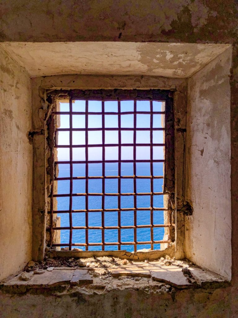 Palazzo d'Avalos prison cell window on Procida, island near naples italy