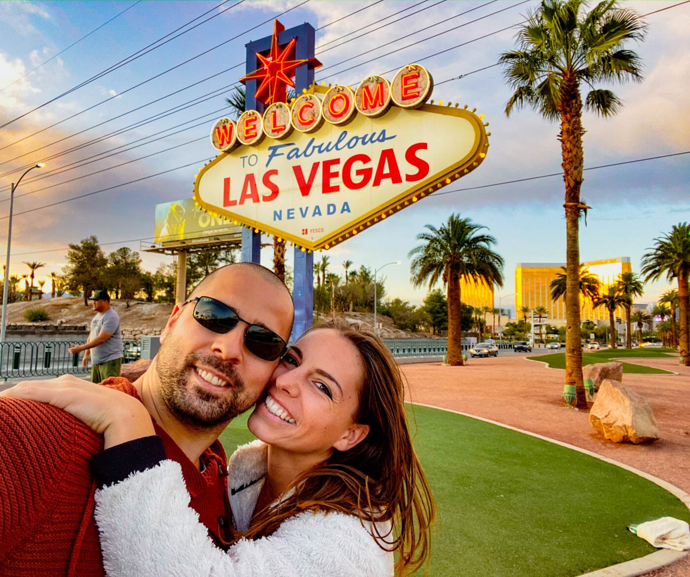 A couple taking a selfie at the Las Vegas Fabulous Welcome Sign