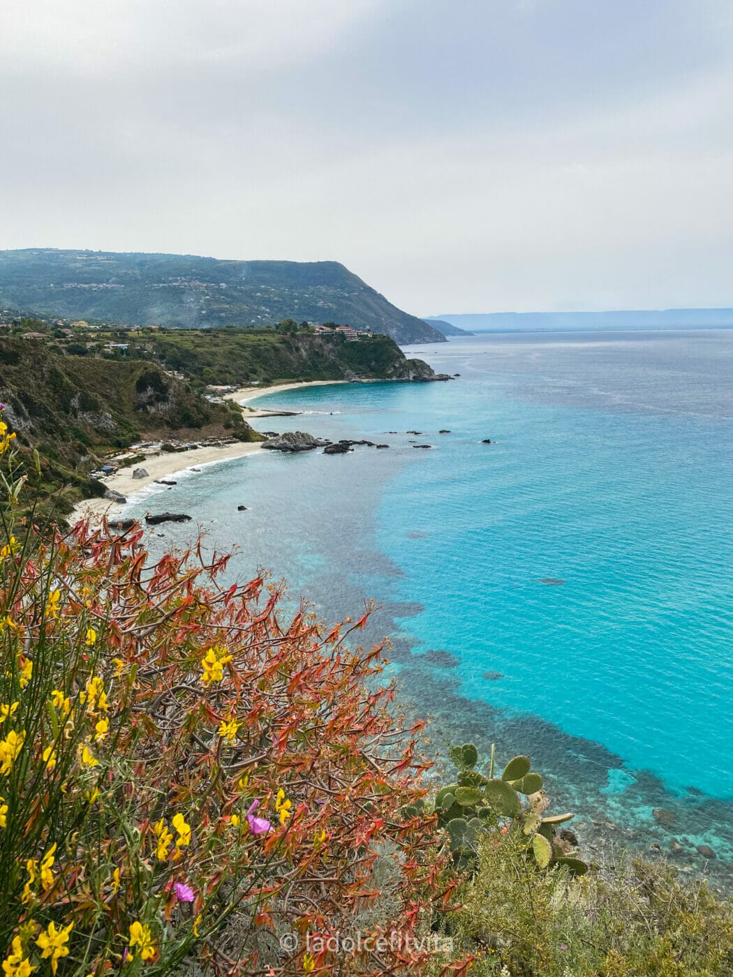 View from Panorama Point in Capo Vaticano onto stunning turquoise waters in Calabria, Italy