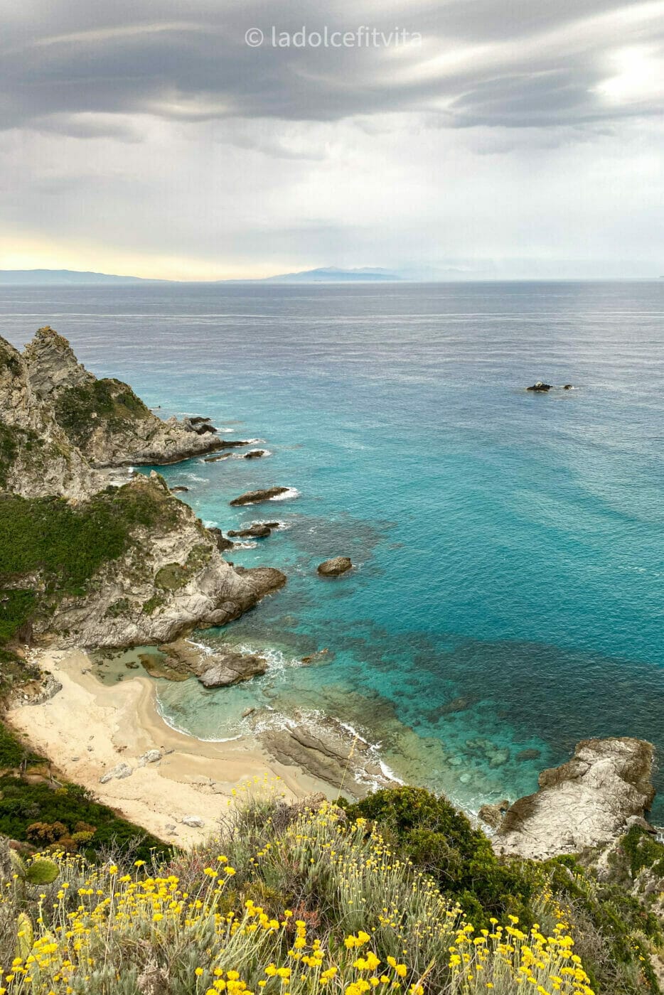 aerial view of the coves and inlets of Praia i Focu beach in Calabria, Italy