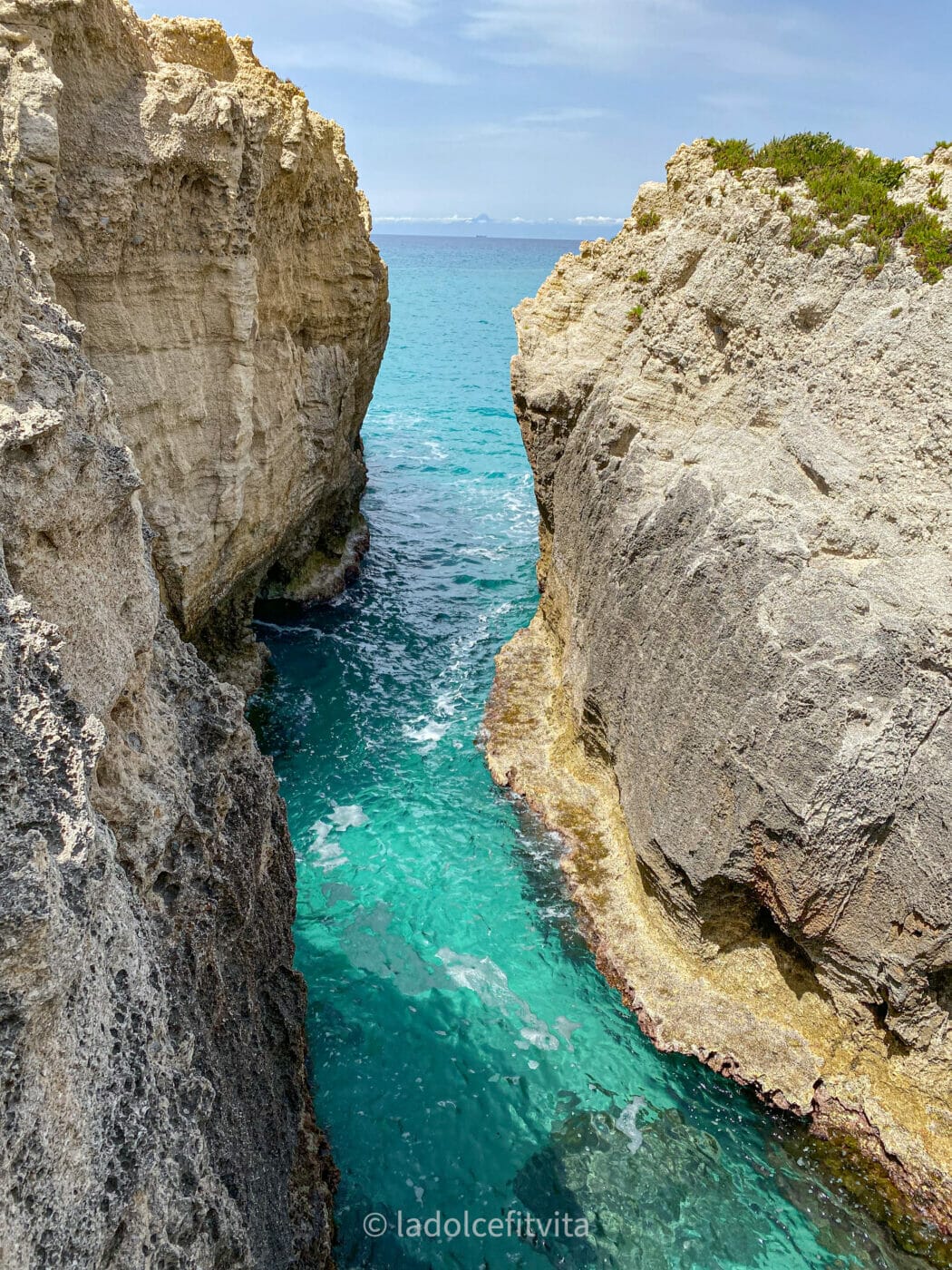 narrow gorge in the reef at riaci beach in calabria Italy