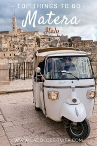 a tuk tuk taking people on a guided tour of matera italy