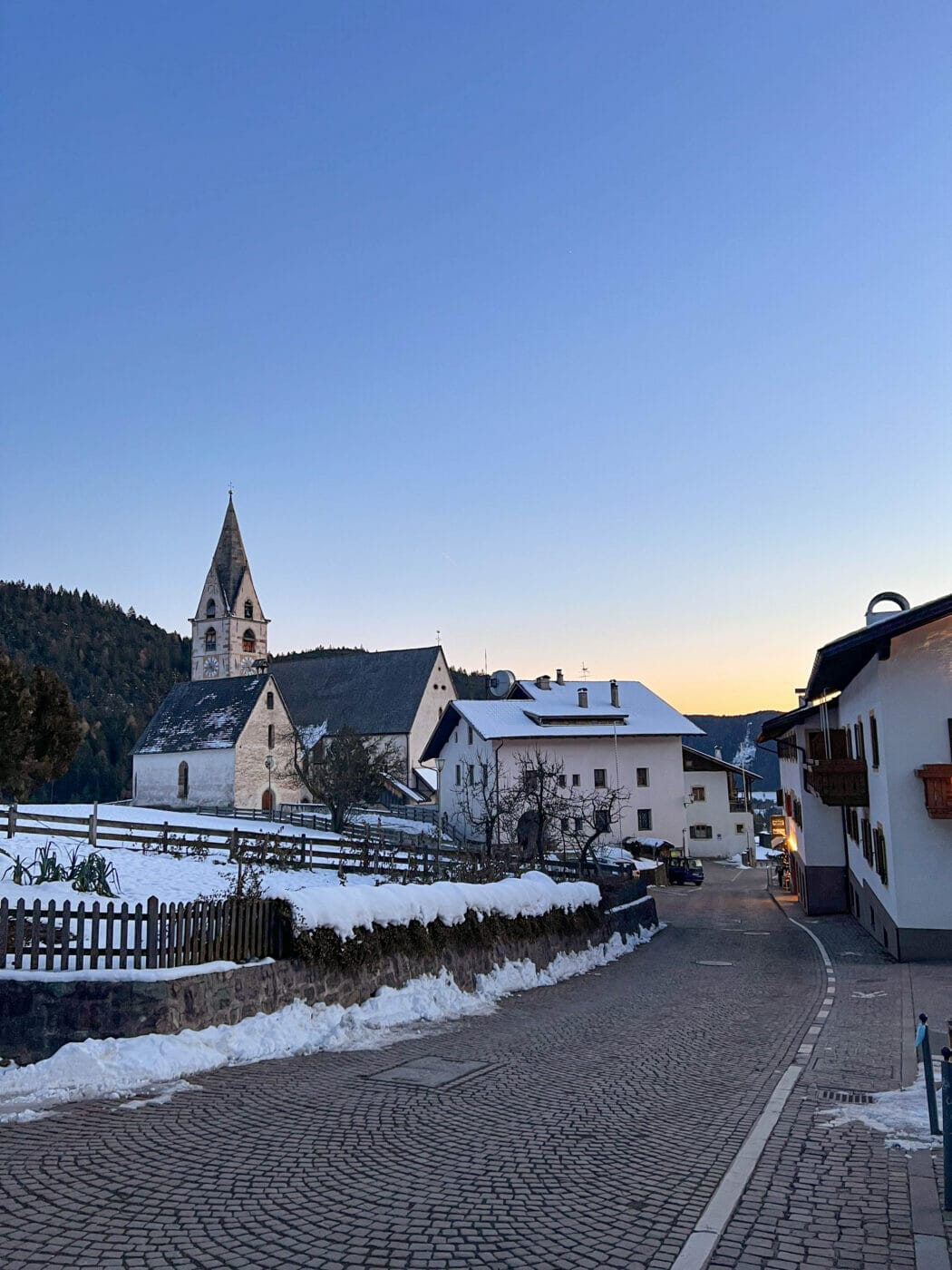 the charming little quaint town of Meltina in the Dolomites during the winter after it had just snowed
