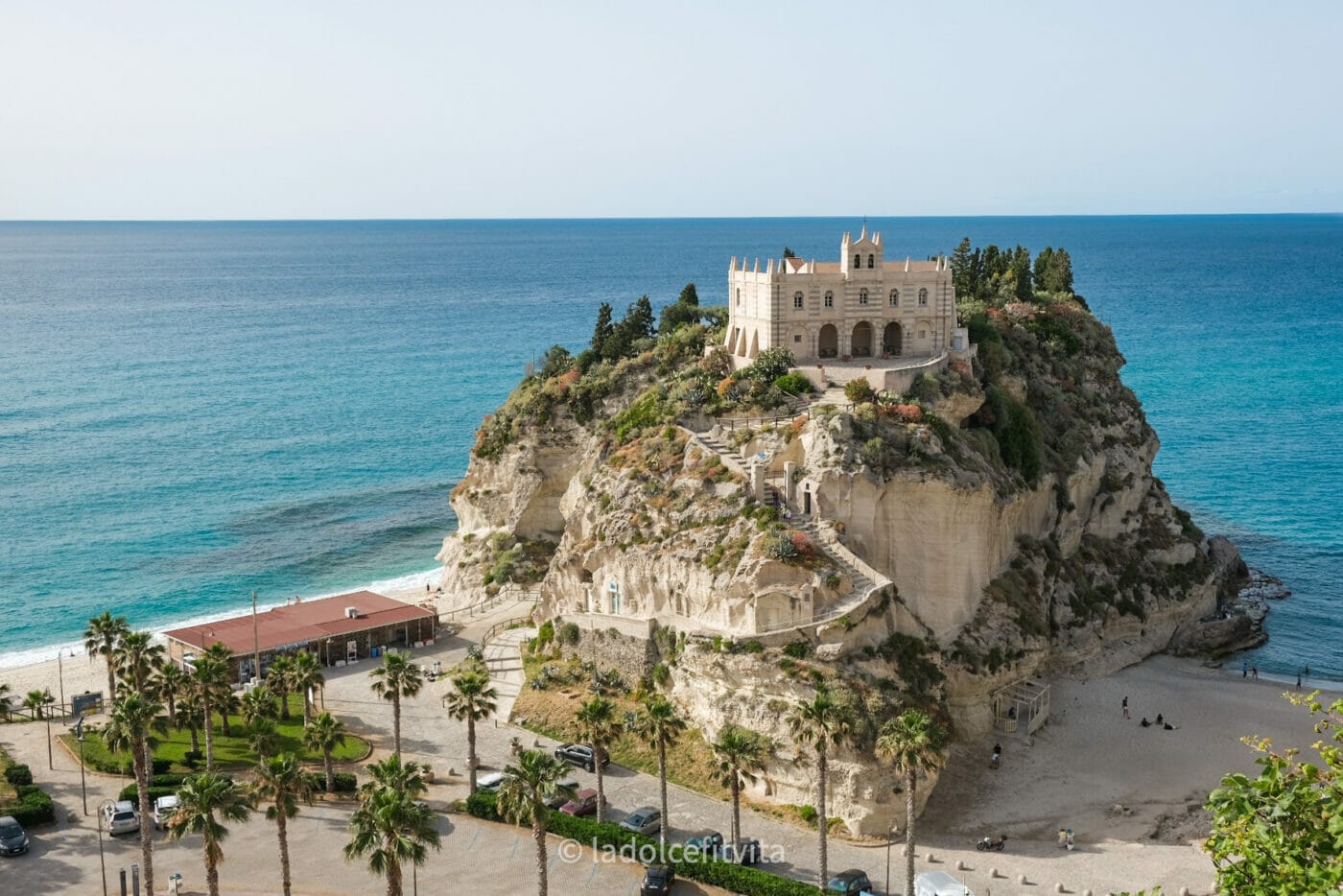 sanctuary di santa maria dell'isola in tropea calabria nestled high on a cliff surrounded by crystalline waters