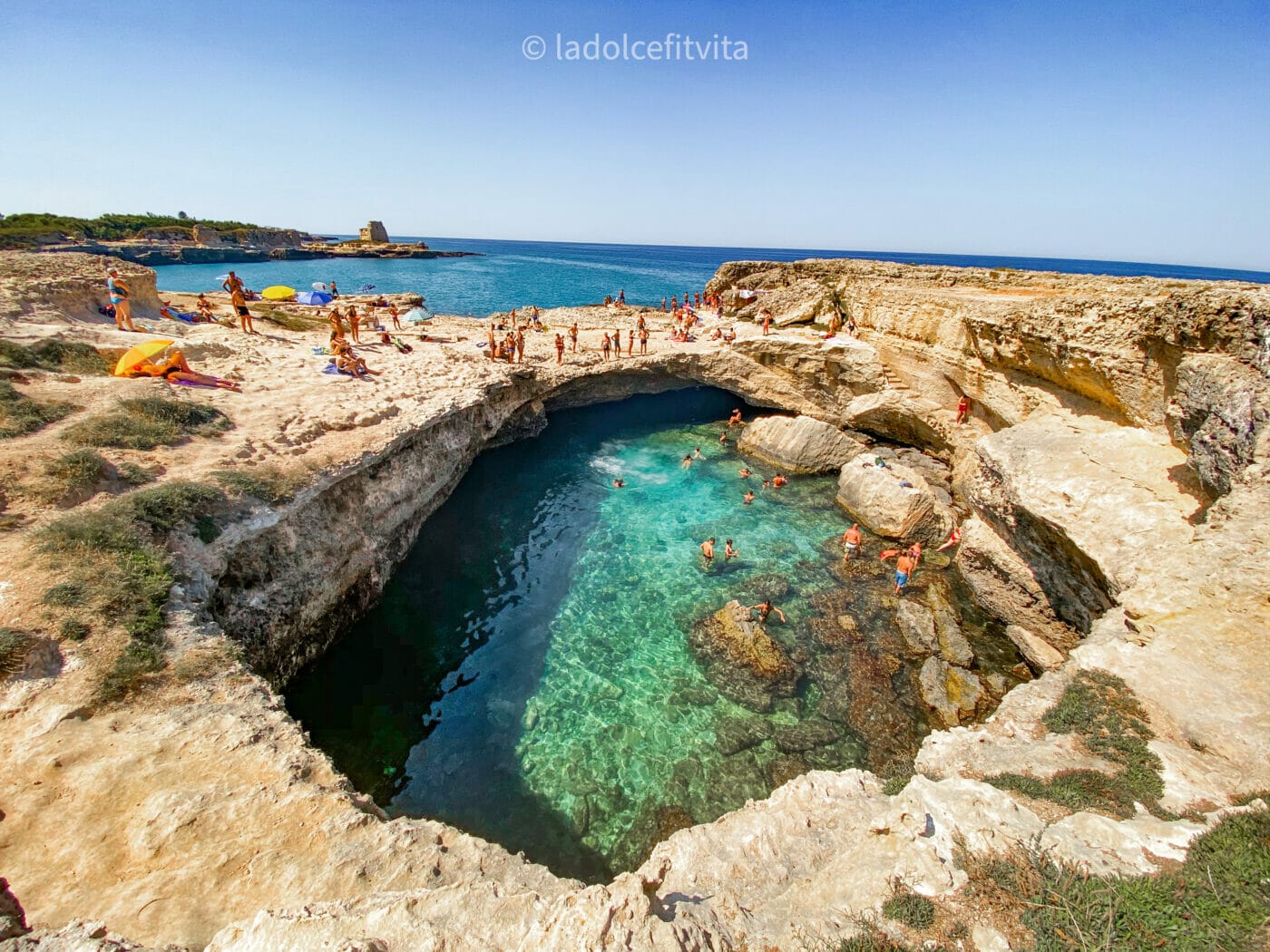 the beautiful crystalline swimming hole known as cave of poetry in southern Puglia in Italy
