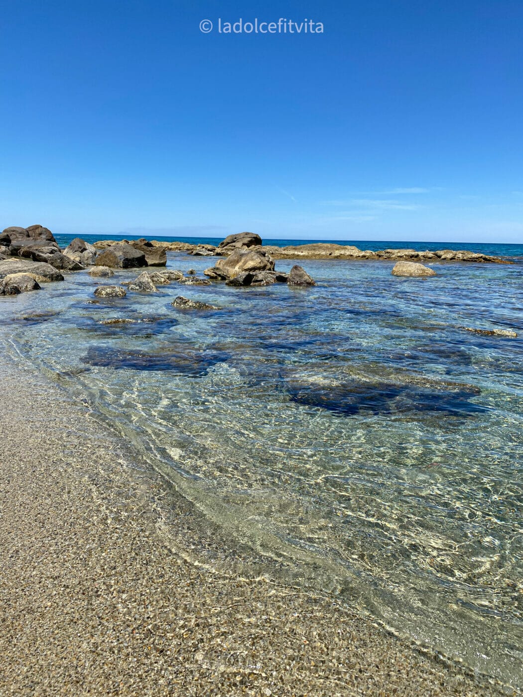 crystalline waters from the shore of Piedigrotta Beach in Pizzo Calabria