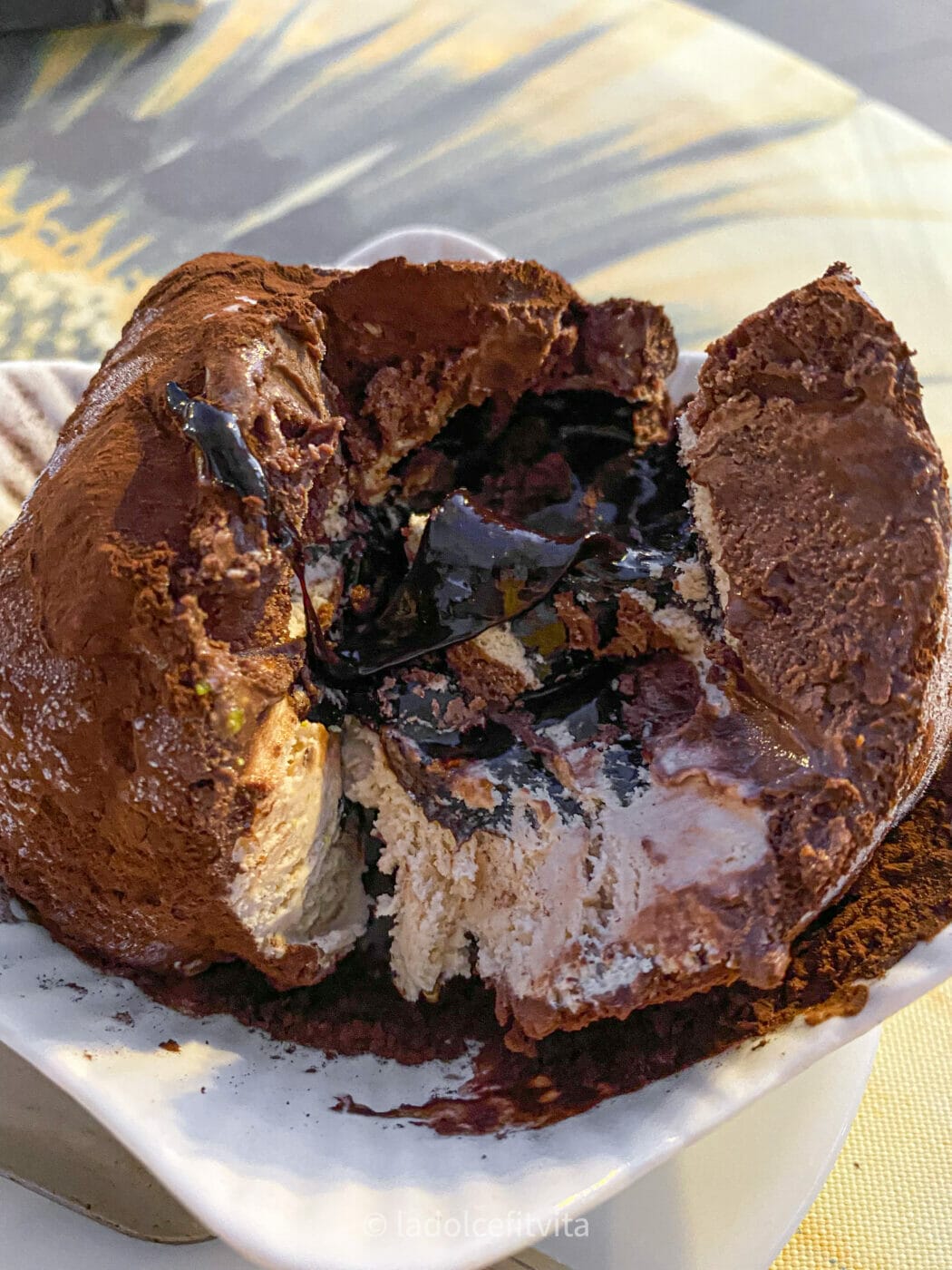 famous Italian chocolate and hazelnut ice cream with molten center called tartufo di pizzo, Calabria