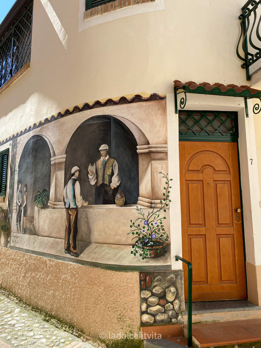 a bakery painted on a wall as a mural in Diamante Italy