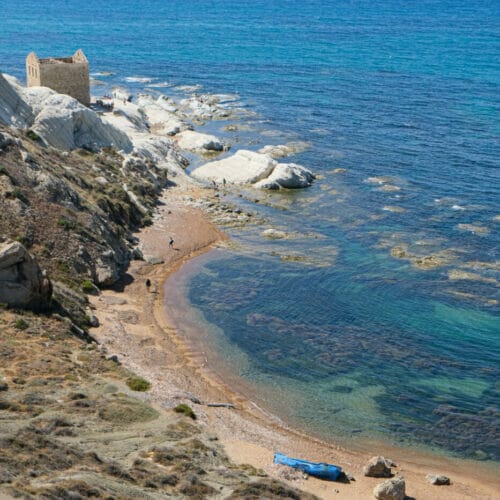 Punta Bianca Beach in sicily - turquoise Mediterranean sea with beautiful white calcareous formations on shore